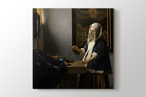 Woman Holding a Balance görseli.