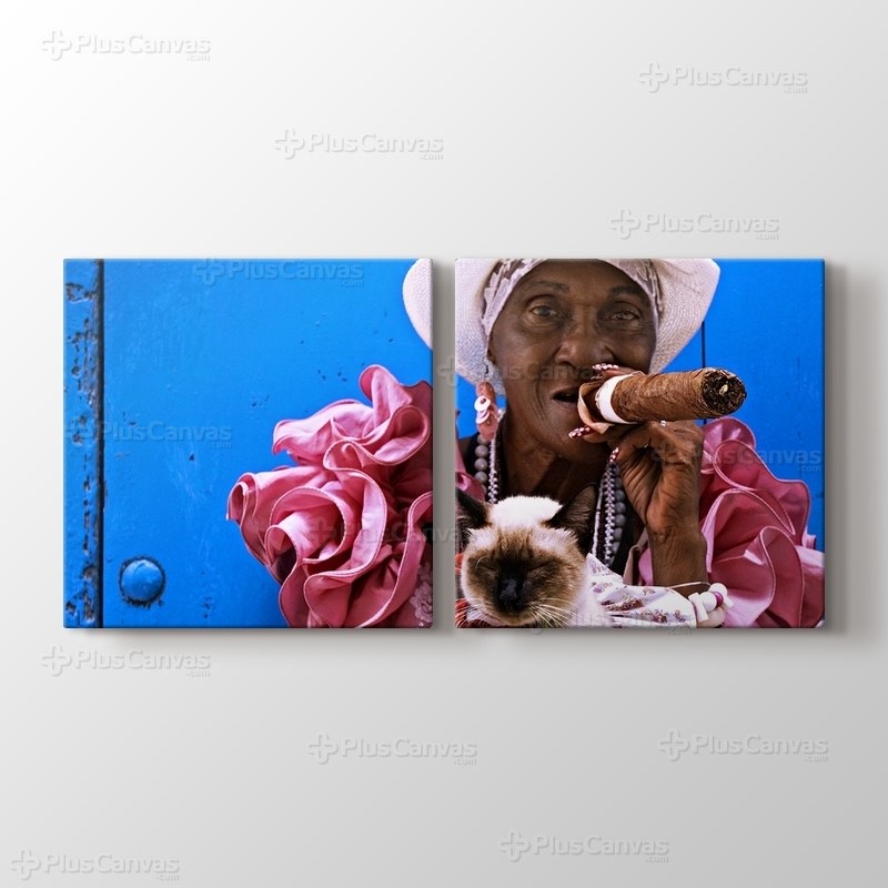 Puro içen Kübalı kadın ve kedi görseli.